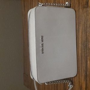 Never used Micheal Kors Jet Set Crossbody purse
